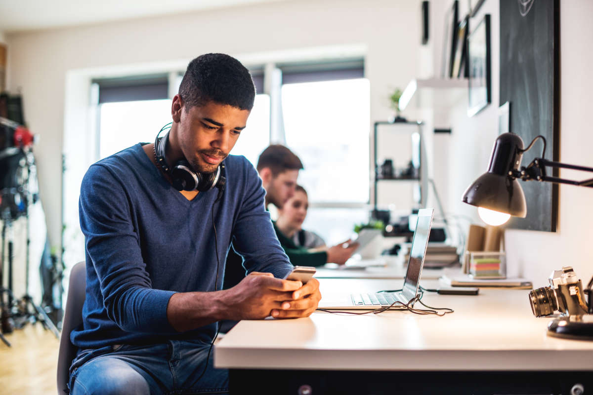 social media analyst analysing social media content and audience reach statistics